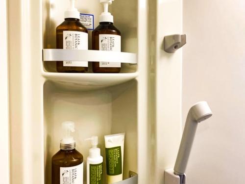 a refrigerator filled with lots of bottles of medicine at the room - Vacation STAY 39604v in Kannoura