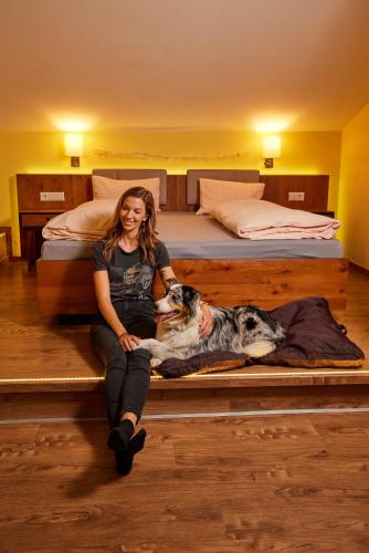 Ένα ή περισσότερα κρεβάτια σε δωμάτιο στο Hotel Grimming dogs&friends
