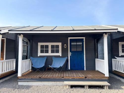 two blue chairs on a porch of a house at the room - Vacation STAY 79941v in Kannoura