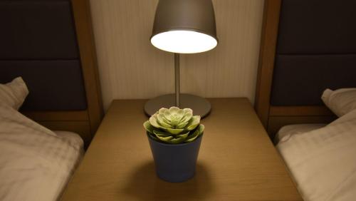 Кровать или кровати в номере Marugamemachi Building 3rd floor - Vacation STAY 51067v