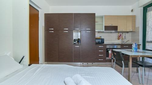 Ένα ή περισσότερα κρεβάτια σε δωμάτιο στο App 15 Accogliente Monolocale