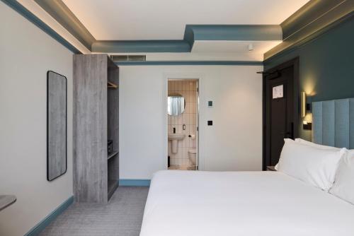 Katil atau katil-katil dalam bilik di The Edwin Hotel