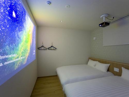 Giường trong phòng chung tại Rakuten STAY Nikko Hoden No pets allowed Capacity of 8 persons with Cypress bath