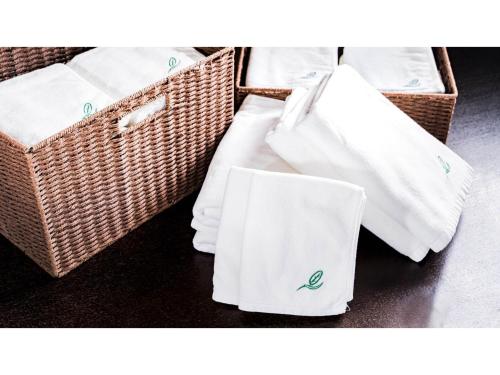 two baskets filled with towels and napkins at Fukugi Terrace - Vacation STAY 61828v in Bise