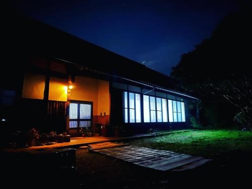 a house at night with a lot of windows at Hoshi no Yadori - Vacation STAY 89344v in Tombaramachi