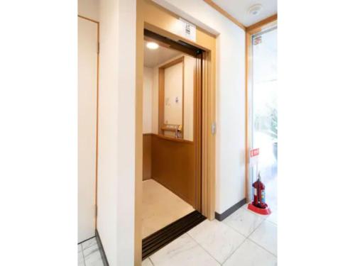 an open door to a hallway in a building at Palm Villa - Vacation STAY 12202 in Takamatsu