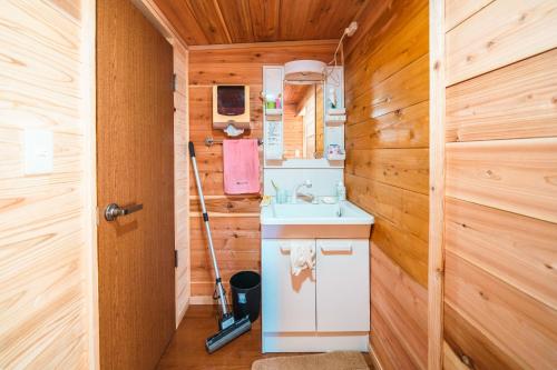 a bathroom with a sink and a toilet in a cabin at Fukouji - Vacation STAY 07341v in Numata