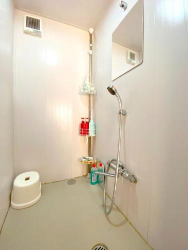 a bathroom with a shower and a toilet in it at Fukouji - Vacation STAY 07341v in Numata