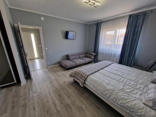 Postel nebo postele na pokoji v ubytování Casa Transilvania Tea