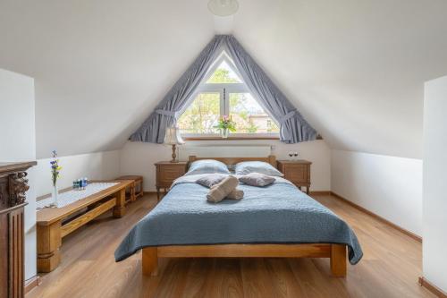 Una cama o camas en una habitación de Villa Nawrot