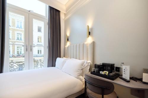 Katil atau katil-katil dalam bilik di The Edwin Hotel