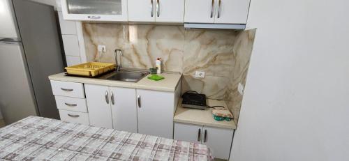 Virtuvė arba virtuvėlė apgyvendinimo įstaigoje apartments sofie 1
