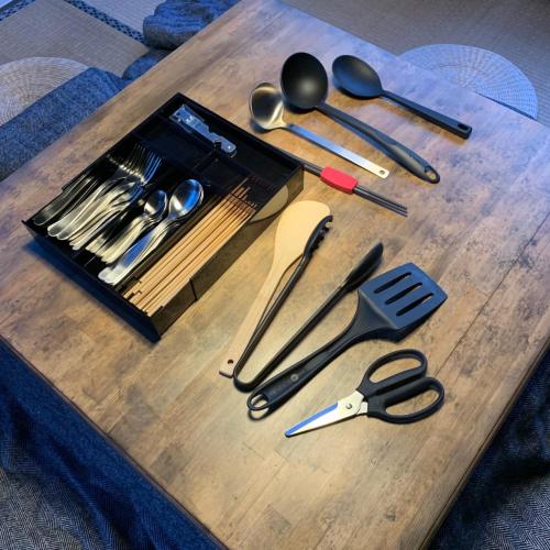 a table with a bunch of utensils on it at uminca - Vacation STAY 09850v in Numazu