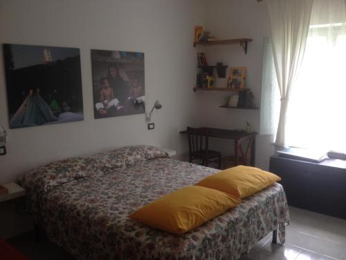Ένα ή περισσότερα κρεβάτια σε δωμάτιο στο Bed & Breakfast La Gaggiaspina