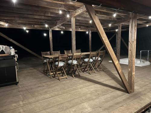 a large room with a wooden table and chairs at Jyuuraku no mori - Vacation STAY 50432v in Awara