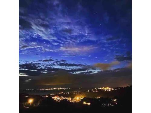 a view of a city at night at Stardust Motobu - Vacation STAY 45756v in Motobu