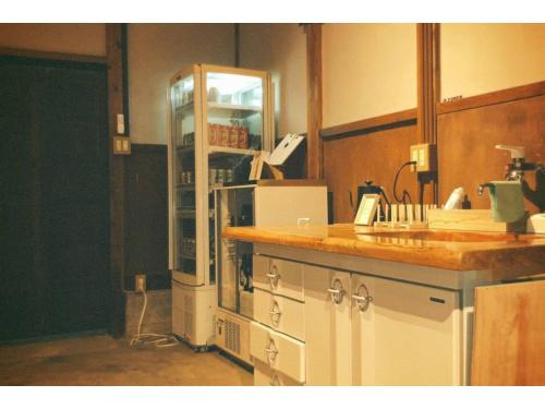 a kitchen with a counter and a sink in it at base sanablend - Vacation STAY 37411v in Kyotango