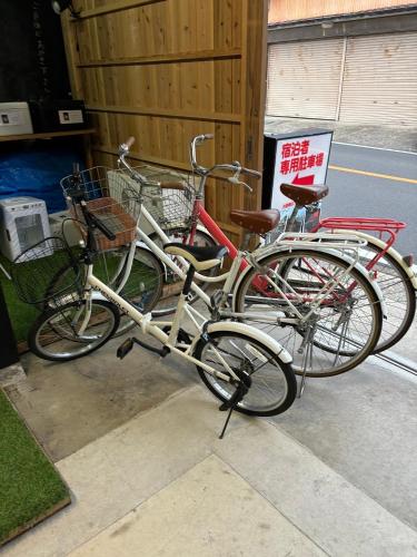 three bikes parked next to each other on a sidewalk at base sanablend - Vacation STAY 37411v in Kyotango