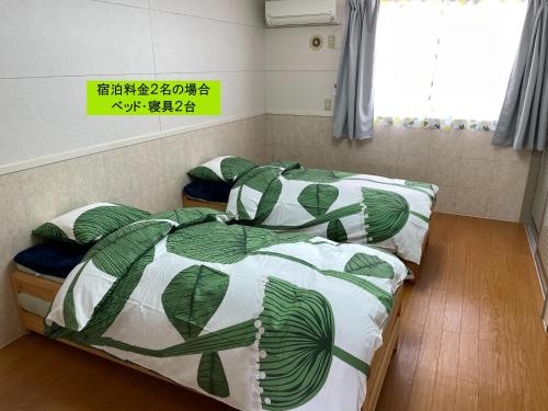 Giường trong phòng chung tại Elegance Kukou Minami A - Vacation STAY 41507v