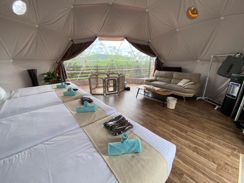 a room with a bed in a tent with a couch at Blissful Garden - Vacation STAY 46374v in Shibukawa