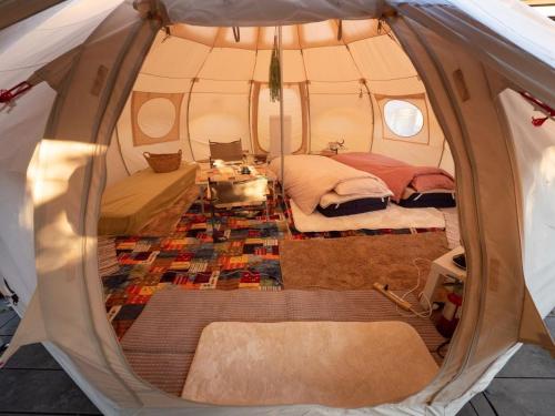a room with two beds in a tent at Rivage Blue - Vacation STAY 24787v in Futtsu