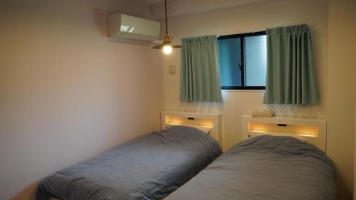 Postel nebo postele na pokoji v ubytování Captain Kangaroo Condo - Vacation STAY 88633v