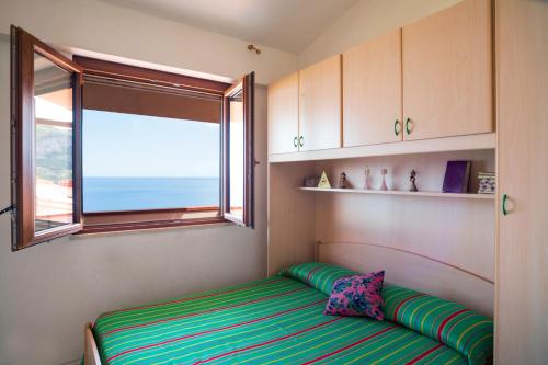 Postel nebo postele na pokoji v ubytování Paradise Residence Vista Mare