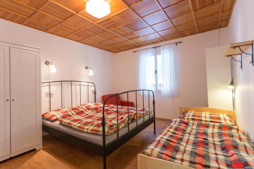 Postel nebo postele na pokoji v ubytování Chata Vranov