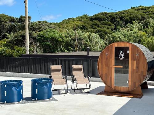 a group of chairs and a wooden sauna at Shima no Yado 〜KON〜 - Vacation STAY 67964v in Oshima