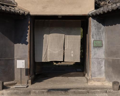 a shirt hanging in a window of a building at Shirafuji - Vacation STAY 01283v in Suzaka
