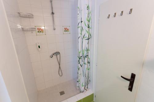 a bathroom with a shower with a shower curtain at Chata Vranov in Vranov nad Dyjí