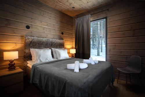 Postel nebo postele na pokoji v ubytování Stay North - Levi West Chalet B