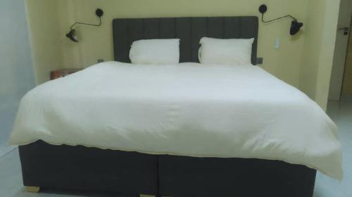 The Cozy Nookにあるベッド