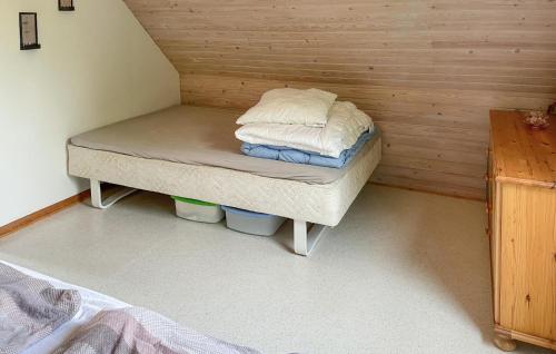 a small bedroom with a bed in a room at Lovely Home In Tranekær With Wifi in Tranekær