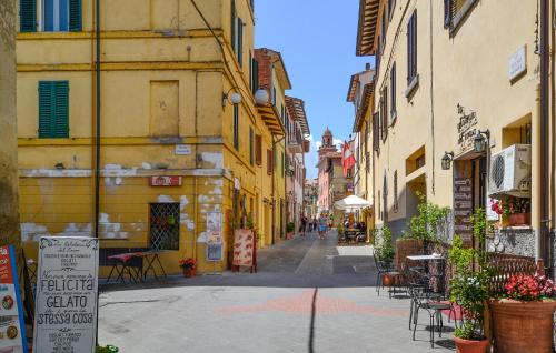 an empty street in a city with buildings at Amazing Apartment In Magione in Magione