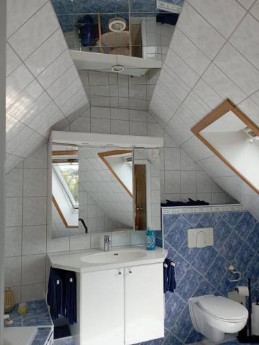 a bathroom with a sink and a toilet at Himmelsleiter in Schneeberg