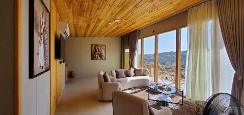 Posezení v ubytování Wakan Farm Villas El Souda - مزرعة وكن الريفية - قرية شرمه