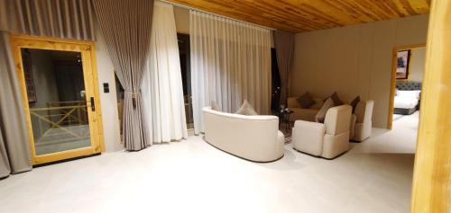Posezení v ubytování Wakan Farm Villas El Souda - مزرعة وكن الريفية - قرية شرمه