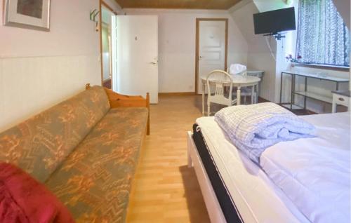 Ένα ή περισσότερα κρεβάτια σε δωμάτιο στο Five Bedroom Beautiful Home In Byxelkrok