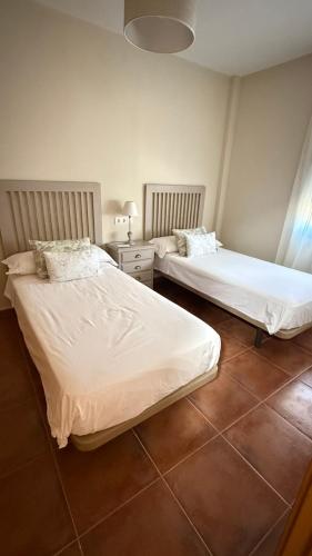 Katil atau katil-katil dalam bilik di Casa Royal, Mancha Real, Jaén