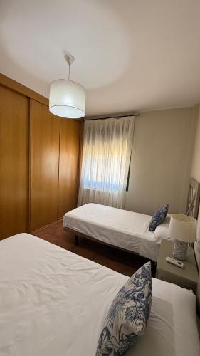 Katil atau katil-katil dalam bilik di Casa Royal, Mancha Real, Jaén