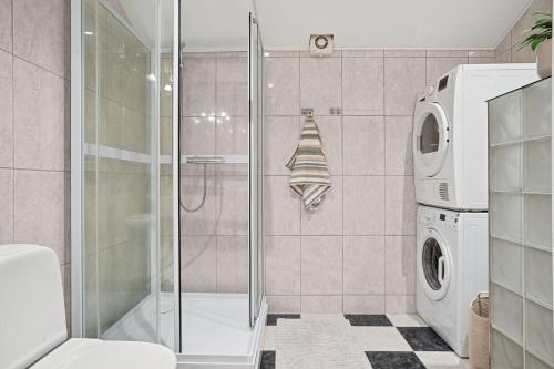 Et badeværelse på Tromsø City Center - two bedroom modern apartment