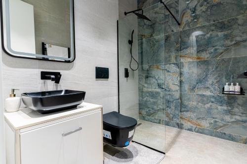 Koupelna v ubytování Luxury Villas near Bucharest National Golf & Country Club