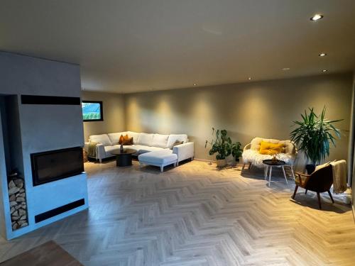 Posezení v ubytování Stort og stilfult hjem med attraktiv beliggenhet