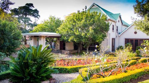 Κήπος έξω από το Candlewoods Guesthouse