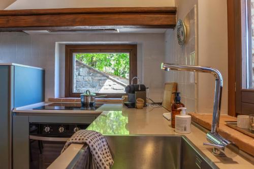Η κουζίνα ή μικρή κουζίνα στο Casale Nido by Great Stays