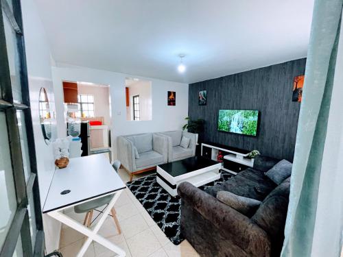 Elegant One Bedroom Apartment - Athi River - Kesit Angaにあるキッチンまたは簡易キッチン