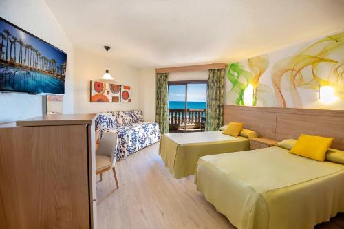 Cama o camas de una habitación en Hotel Servigroup Papa Luna 4 Sup