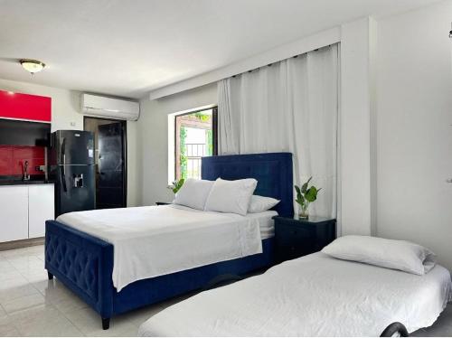 Ένα ή περισσότερα κρεβάτια σε δωμάτιο στο Loft con vista al mar 2