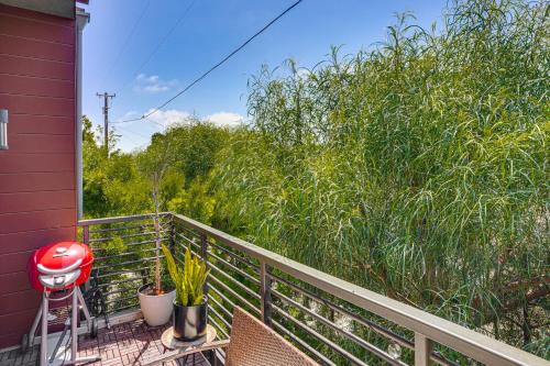 a balcony with chairs and trees on a house at 2 Mi to Beach Luxe LA-Area Townhome with Balcony in San Pedro